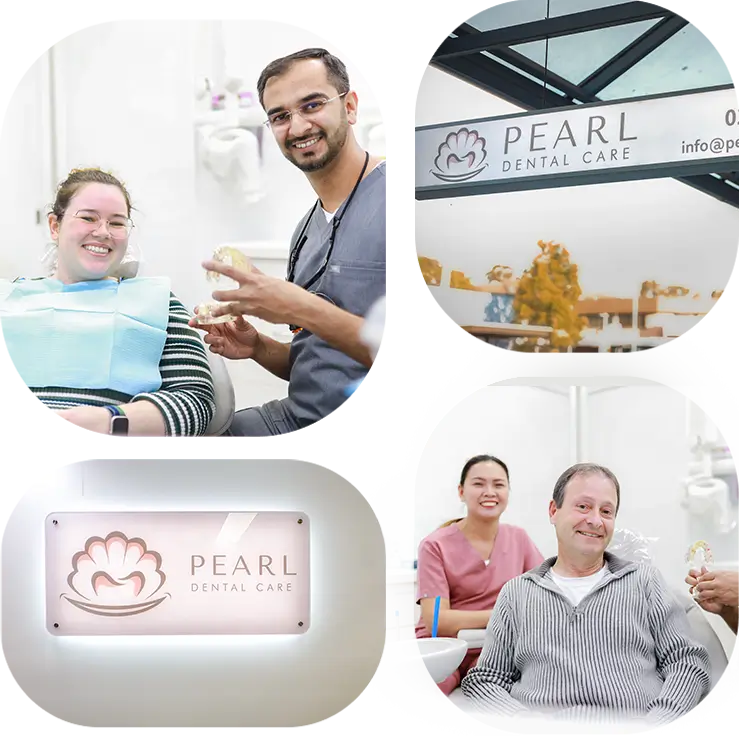 Dental team member holding a tooth model beside a smiling person in a dental chair
