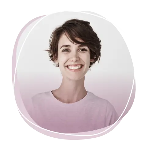 Smiling woman with short dark hair wearing a light pink t-shirt
